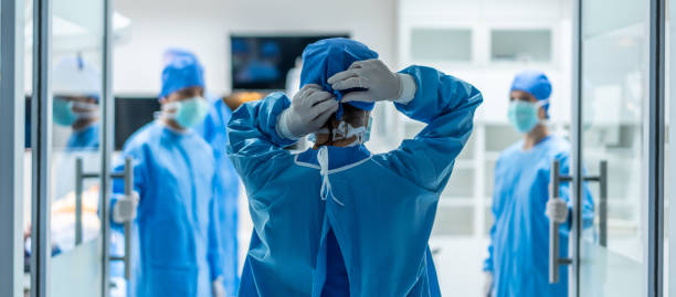 Doctor and Nurses working in surgery room